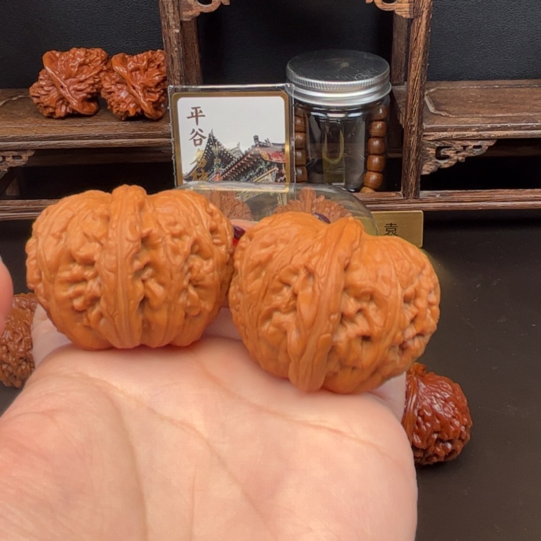 桃核把件平谷一代元宝高货