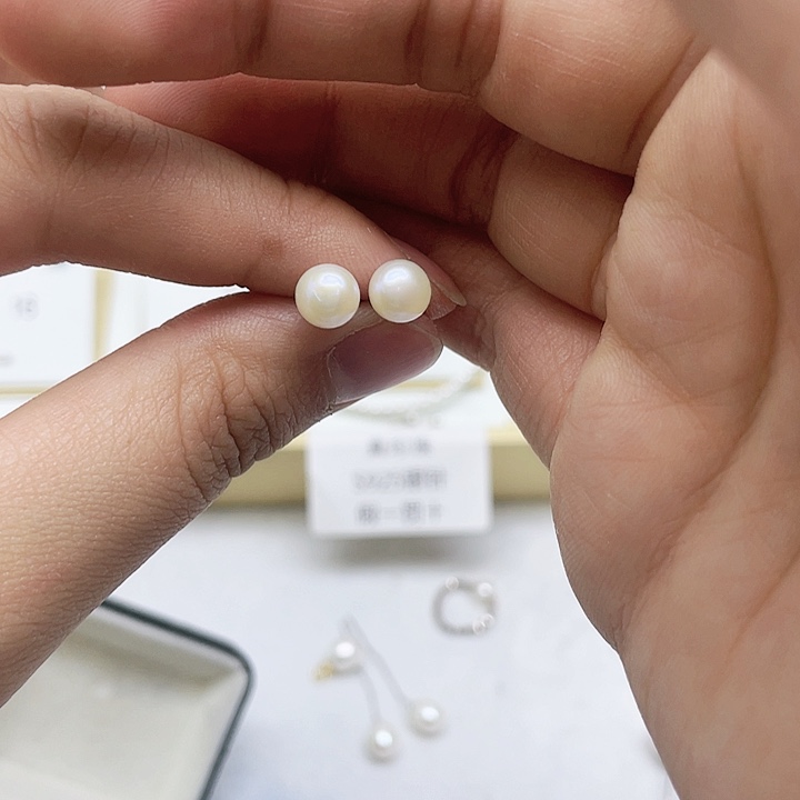 淡水珍珠耳饰银S925镶嵌不****?
