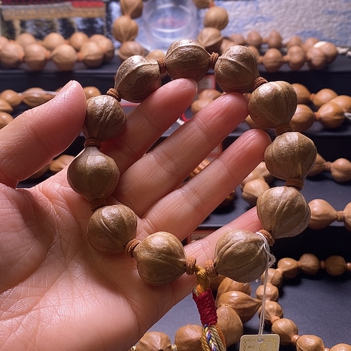 绅***路橄榄核手串蜜桃臀20×22