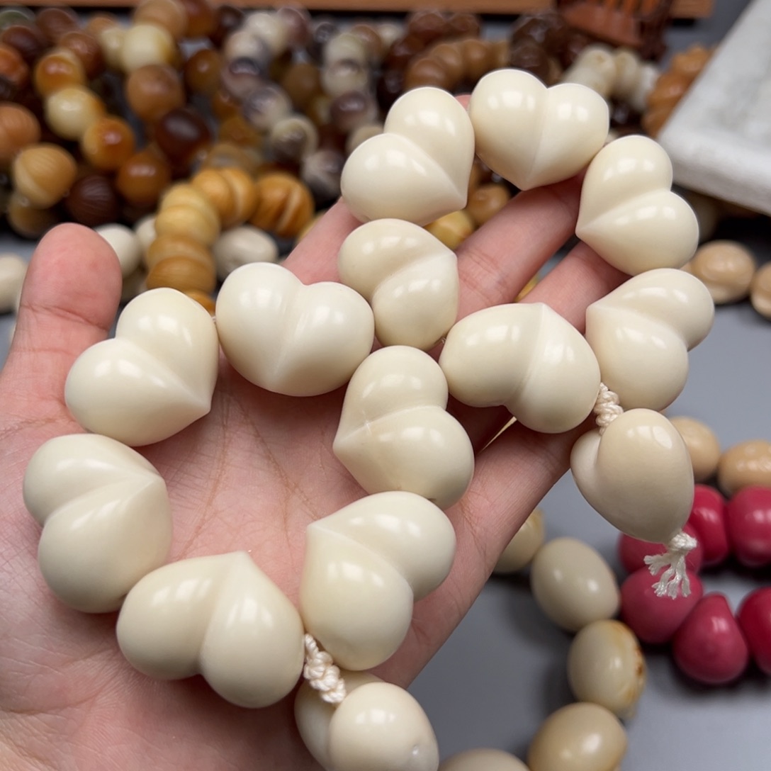 菩提根/象牙果吊坠Q866四叶草25-30瑕疵一串随机