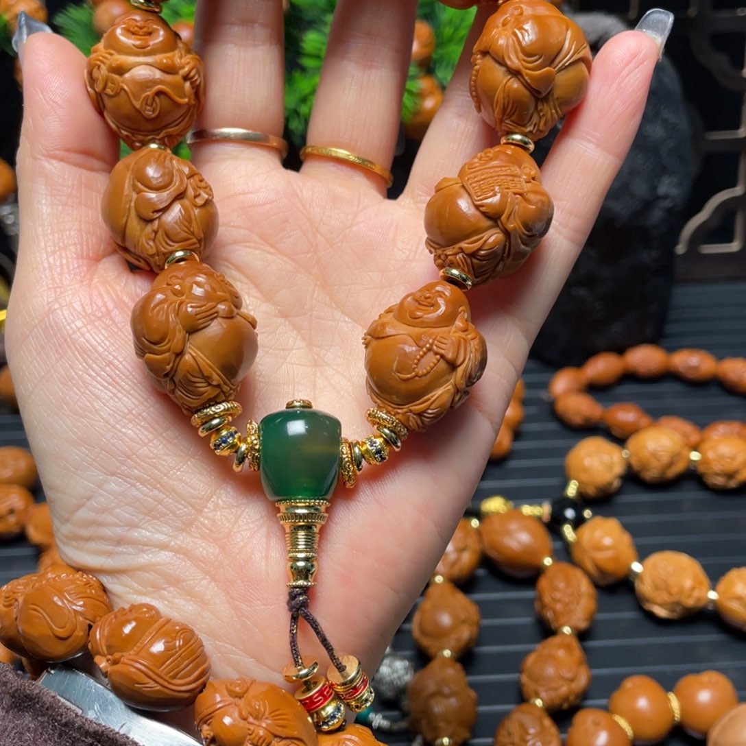 鑫***轩橄榄核手串/手链苏工弥勒