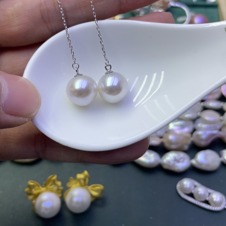 淡水珍珠耳饰银S925镶嵌酒***