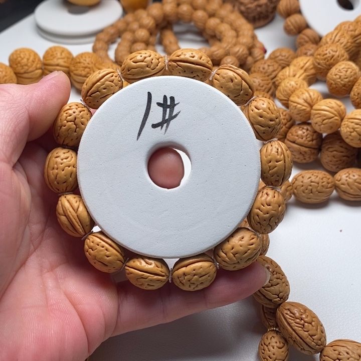 墨****吊坠桃核桃核手串钱袋