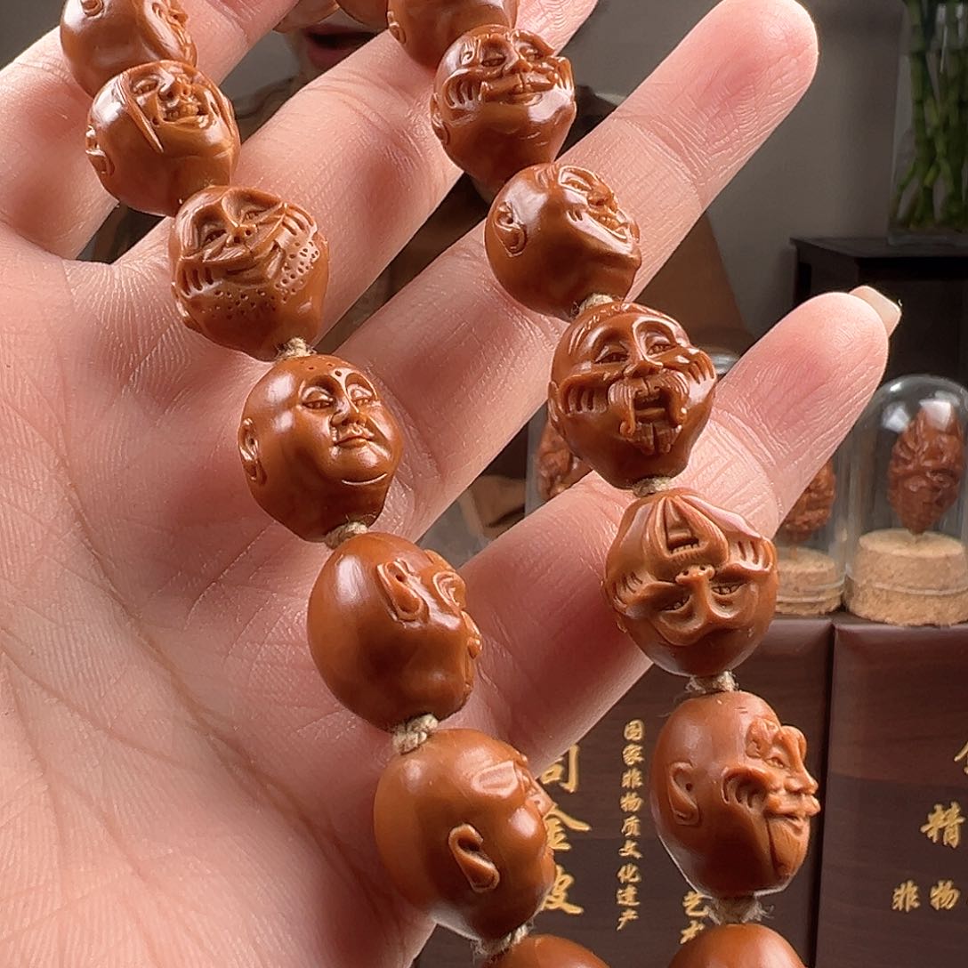 橄榄核吊坠主**碑橄榄核雕橄榄核