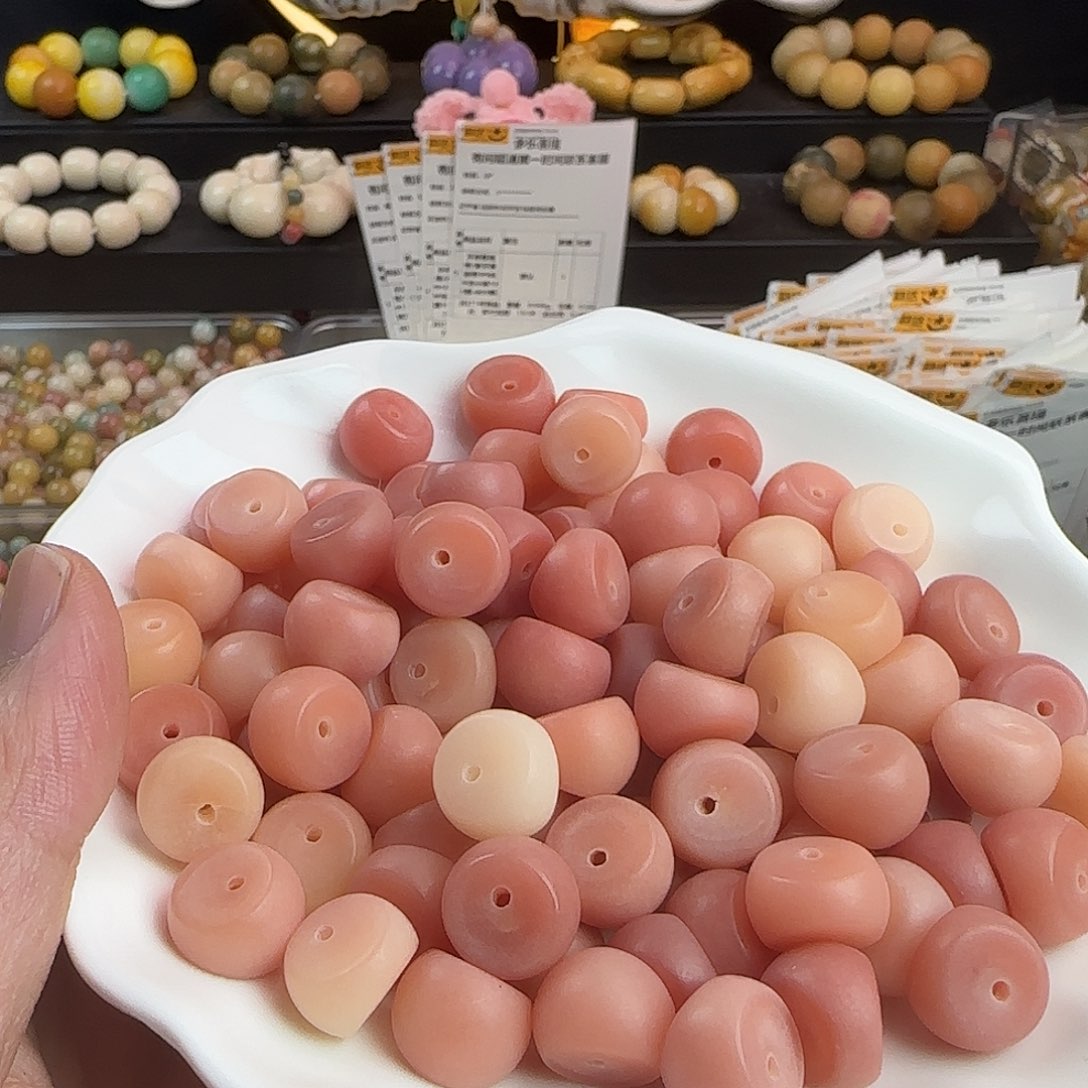 菩提根/象牙果手串微瑕卡13/14粉色蒜瓣60颗