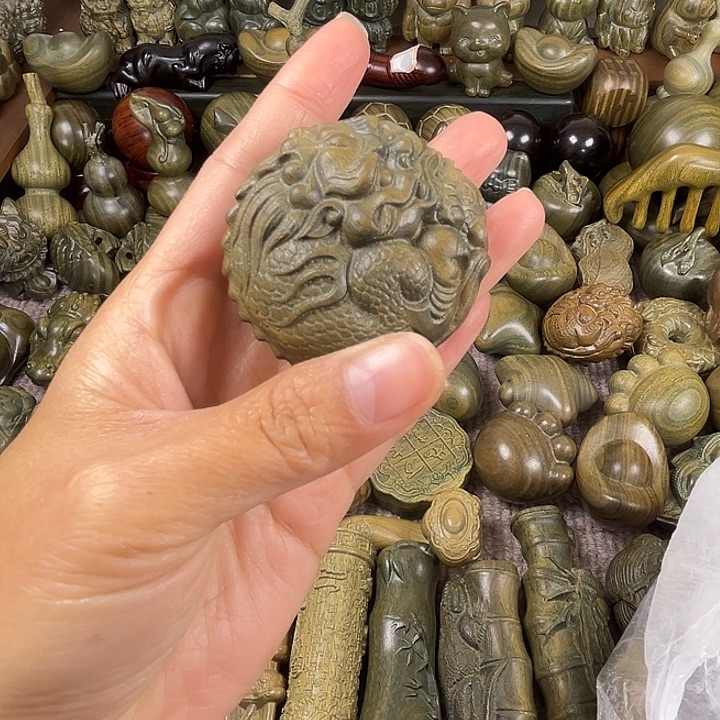 碧***天木阿根廷绿檀貔貅抱球