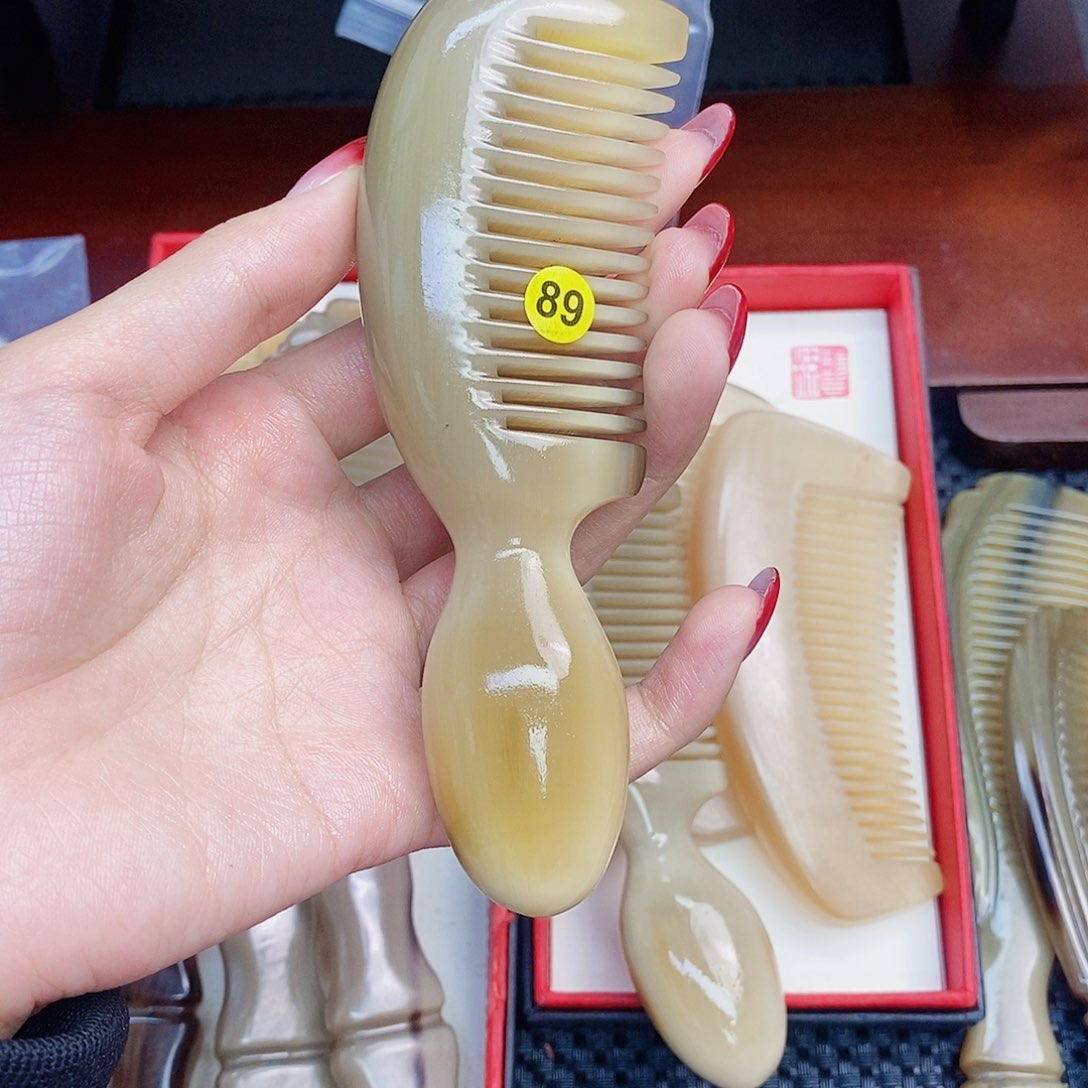 纯手工制作纯牛角梳子阳*