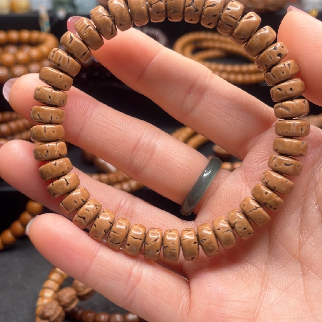 紫金鼠手串9*5桃核片手串