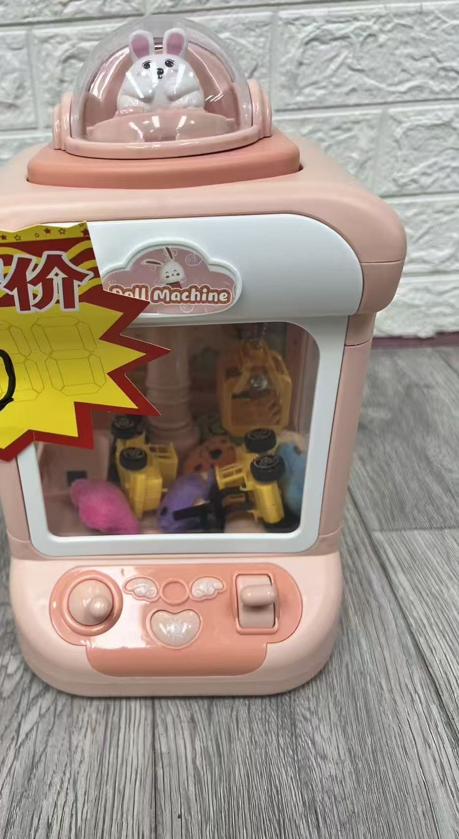 小型家用抓娃娃机夹公仔扭蛋糖果球益智玩具