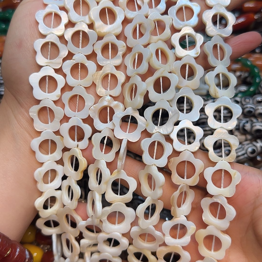 玛瑙/玉髓未镶嵌珠宝半成品五瓣花贝壳一条