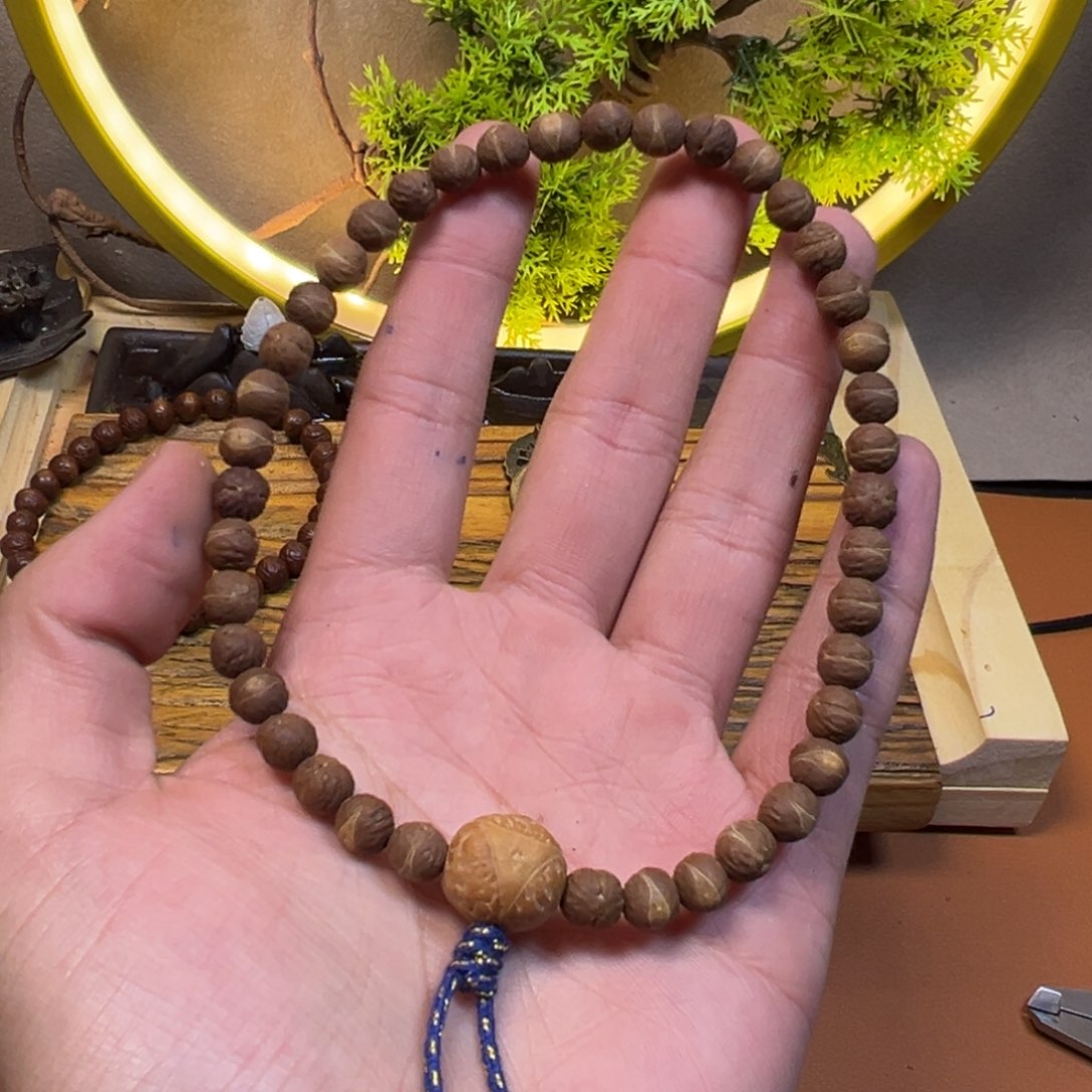 酸枣核凤眼原皮手持7