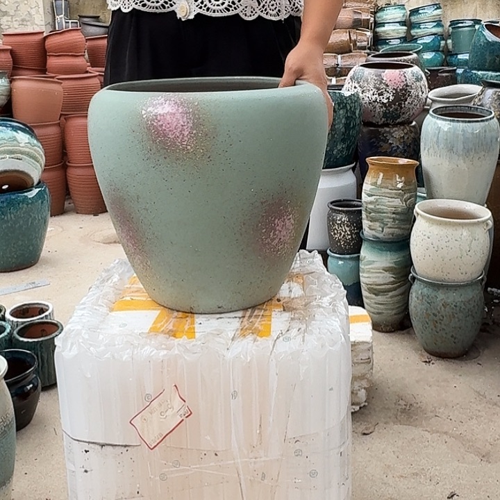 口27高30瑕疵一g盆子。  