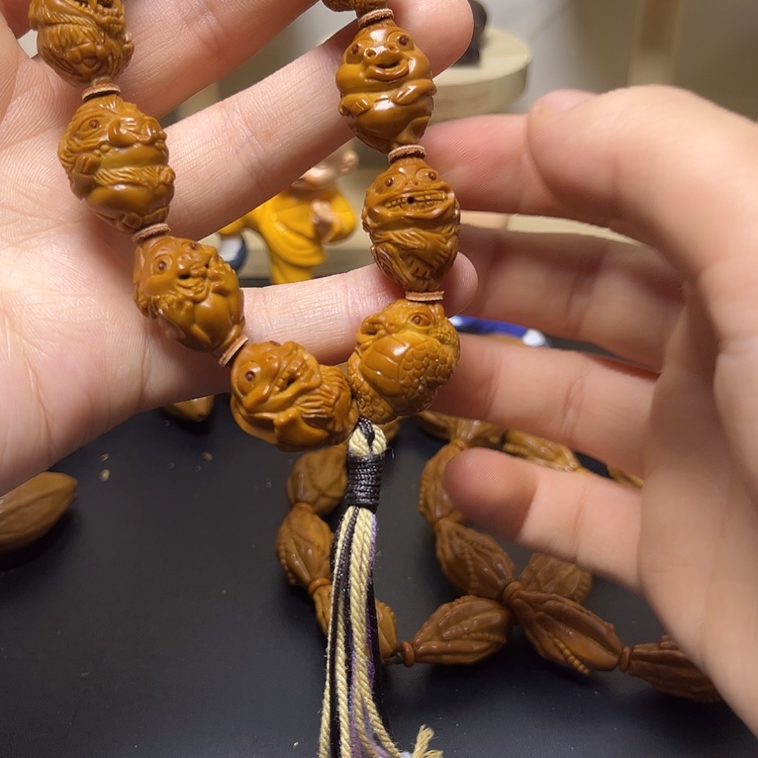 橄榄核吊坠图图咯哦哦哦