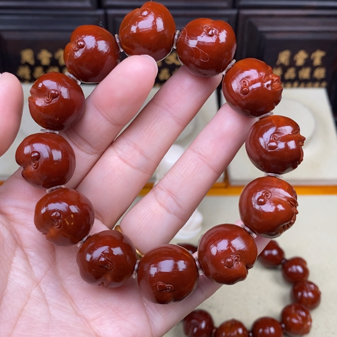 洛***威吊坠橄榄核人生百态