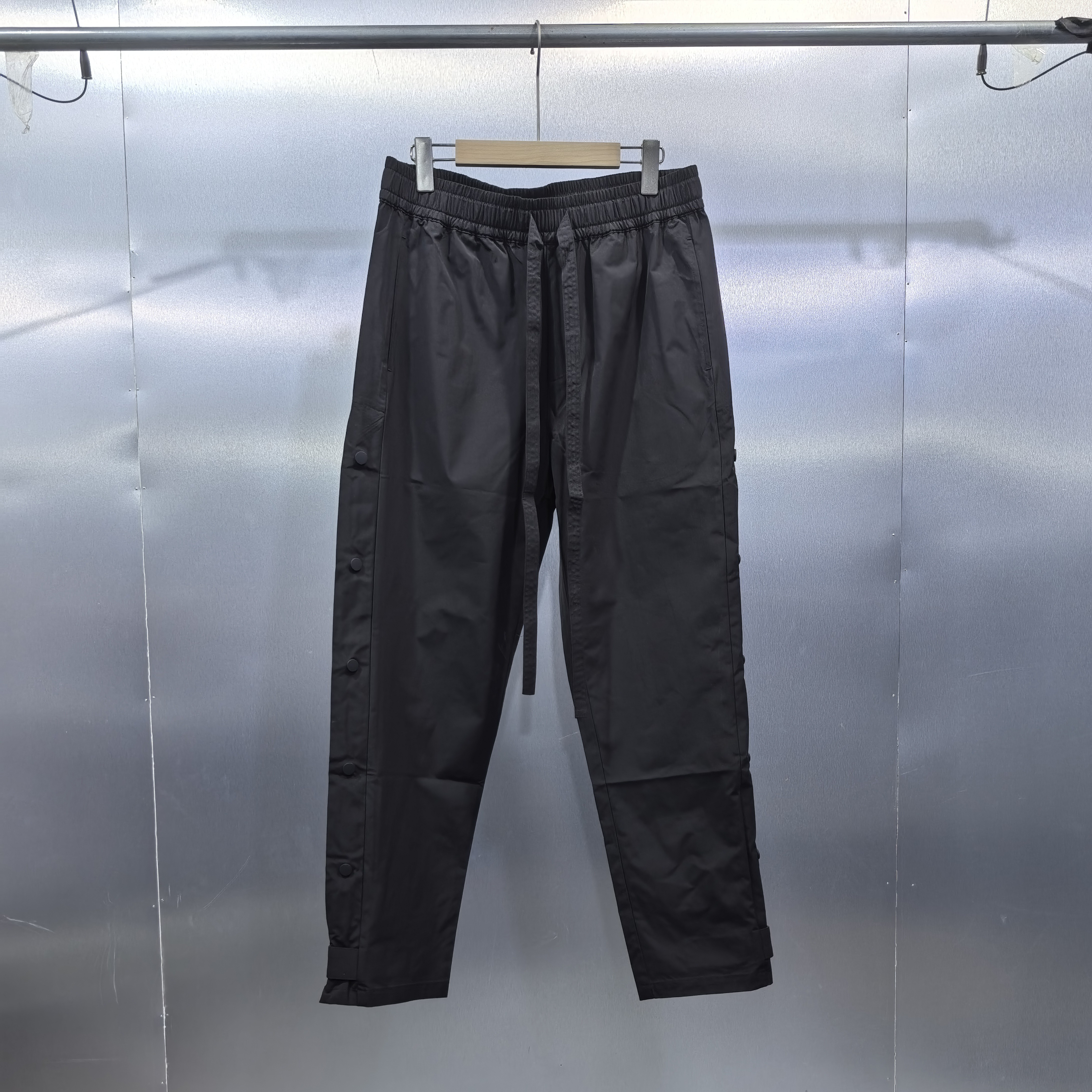 Y05-111121-CLI春秋款侧边排扣设计百搭抽绳休闲裤