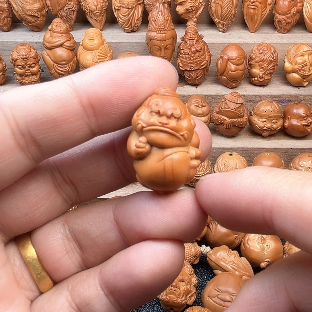 橄榄核吊坠20貔恘福利