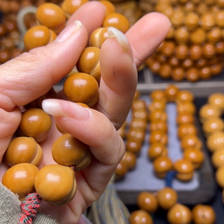 吊坠橄榄核拾**?聚宝盆