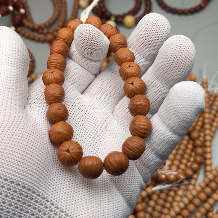 Z***l猴头核桃吊坠凤羽三棱