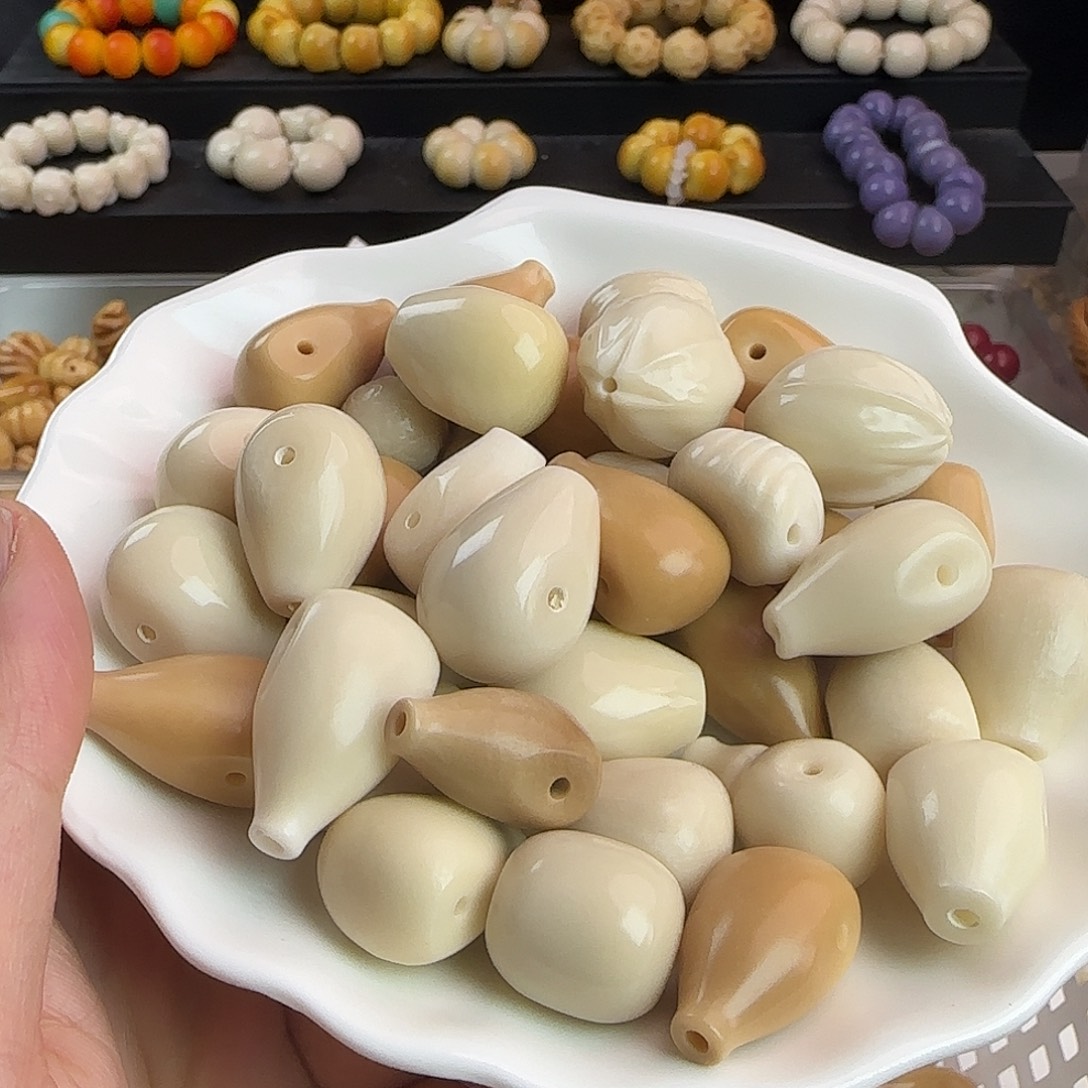 手串菩提根/象牙果微瑕疵三通10颗（随机发）