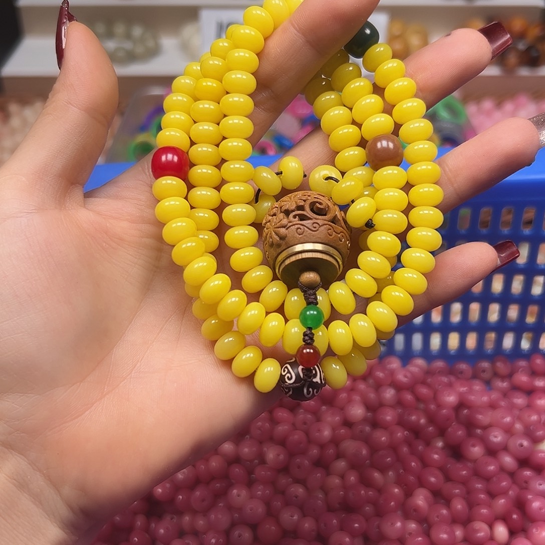 手串菩提根/象牙果卡9黄金算盘1条
