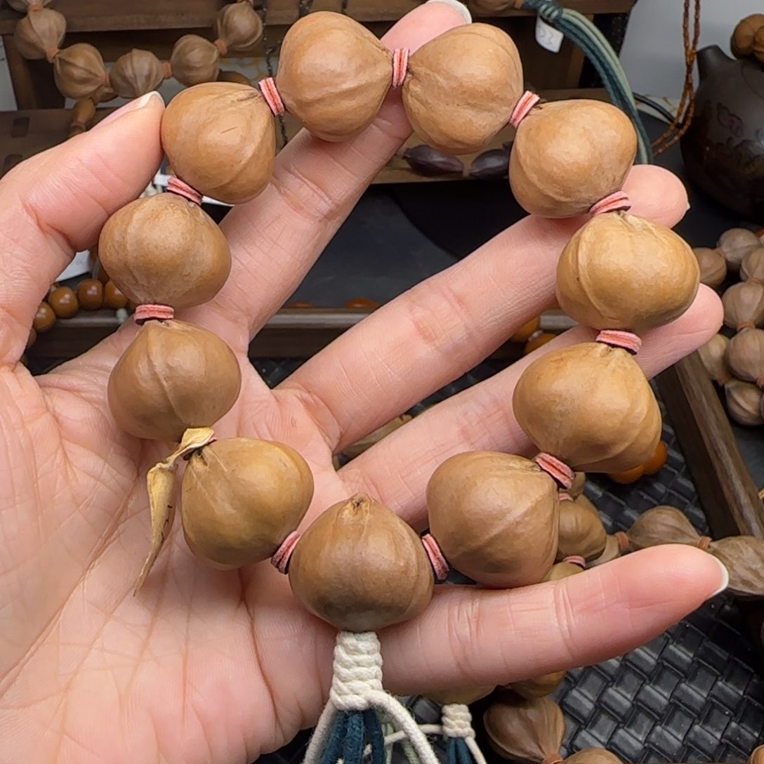 手串橄榄核12。2.2*2.1三花老核