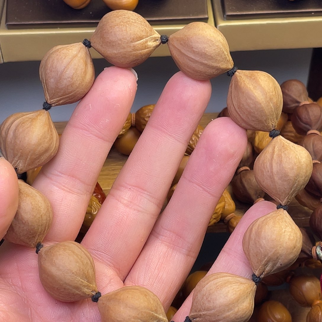 橄榄核手串/手链2025蜜桃臀
