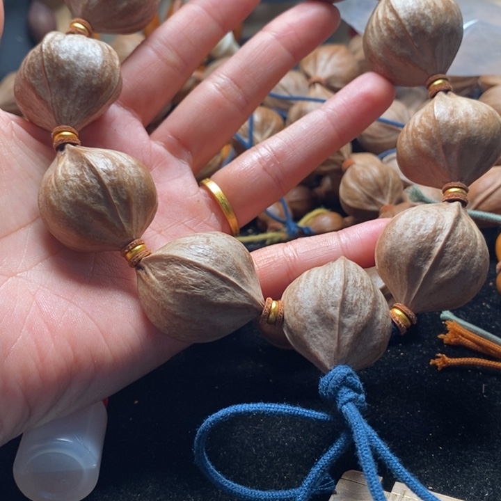 一***子手串/手链橄榄核2.9四花短原皮