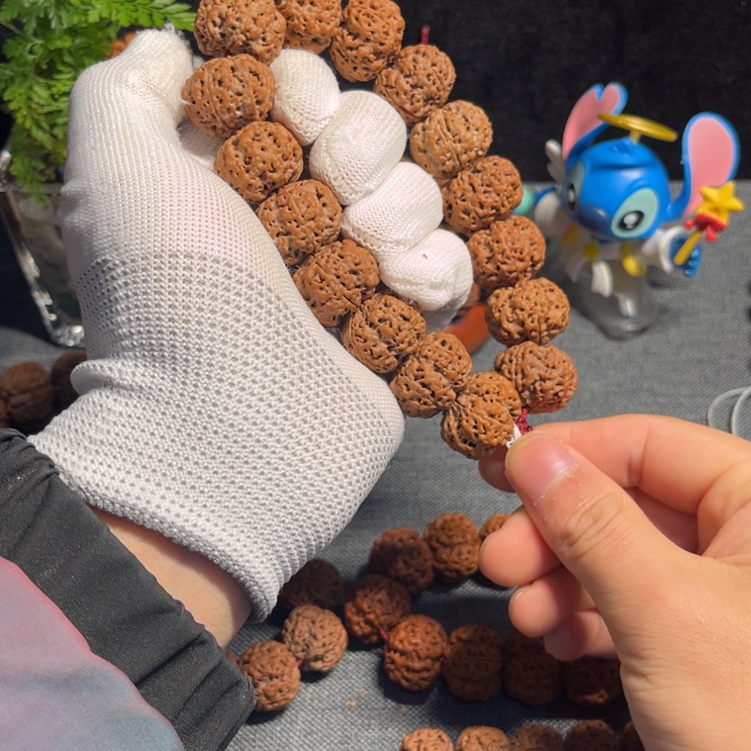 程***佛金刚菩提手串纽扣梅花