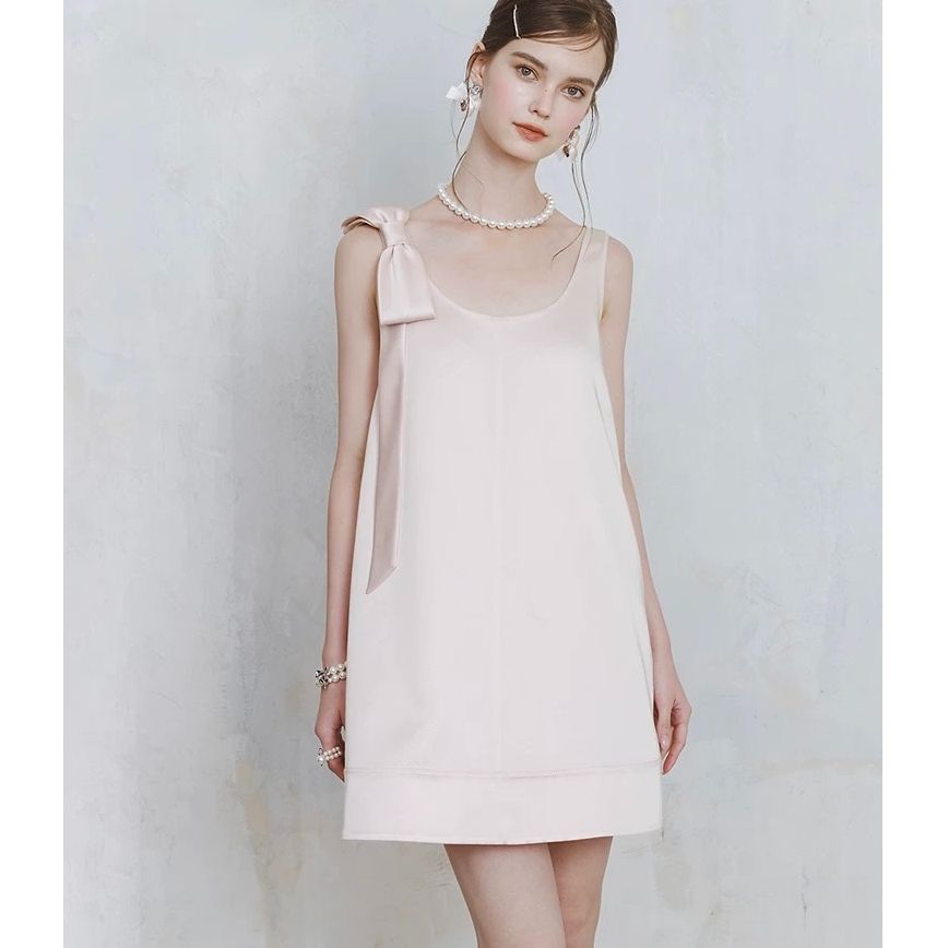 初恋千金风连衣裙2025夏季新款减龄气质蝴蝶结粉色吊带裙背心短裙