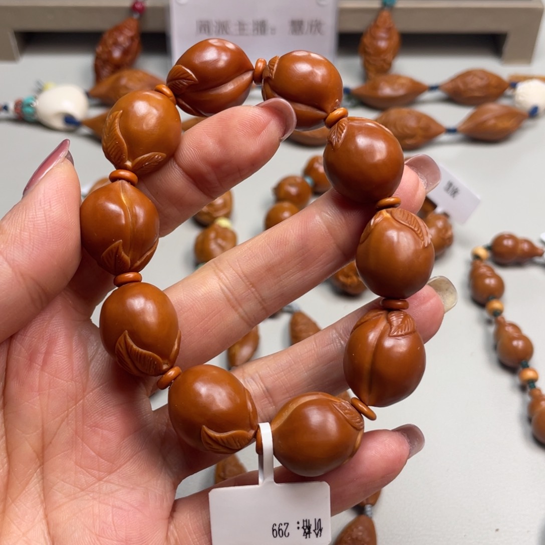 橄榄核手串榴**兔橄榄核雕工艺