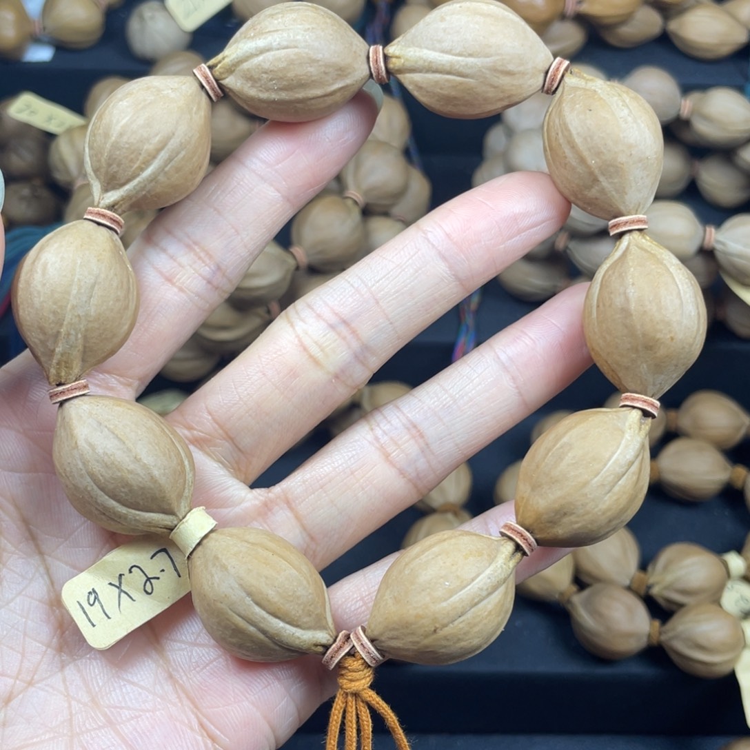 006橄榄核三花19*27