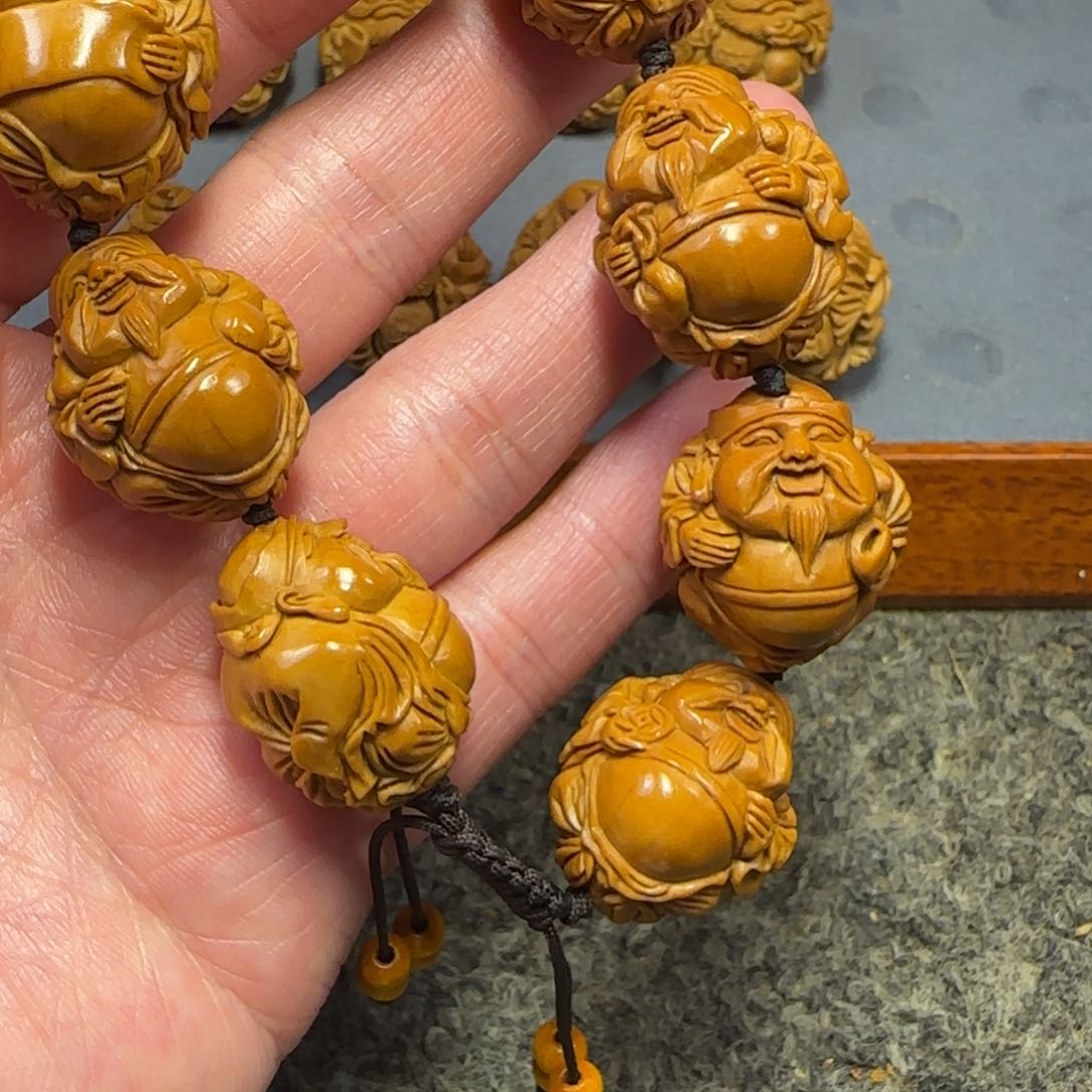 橄榄核吊坠八方来财