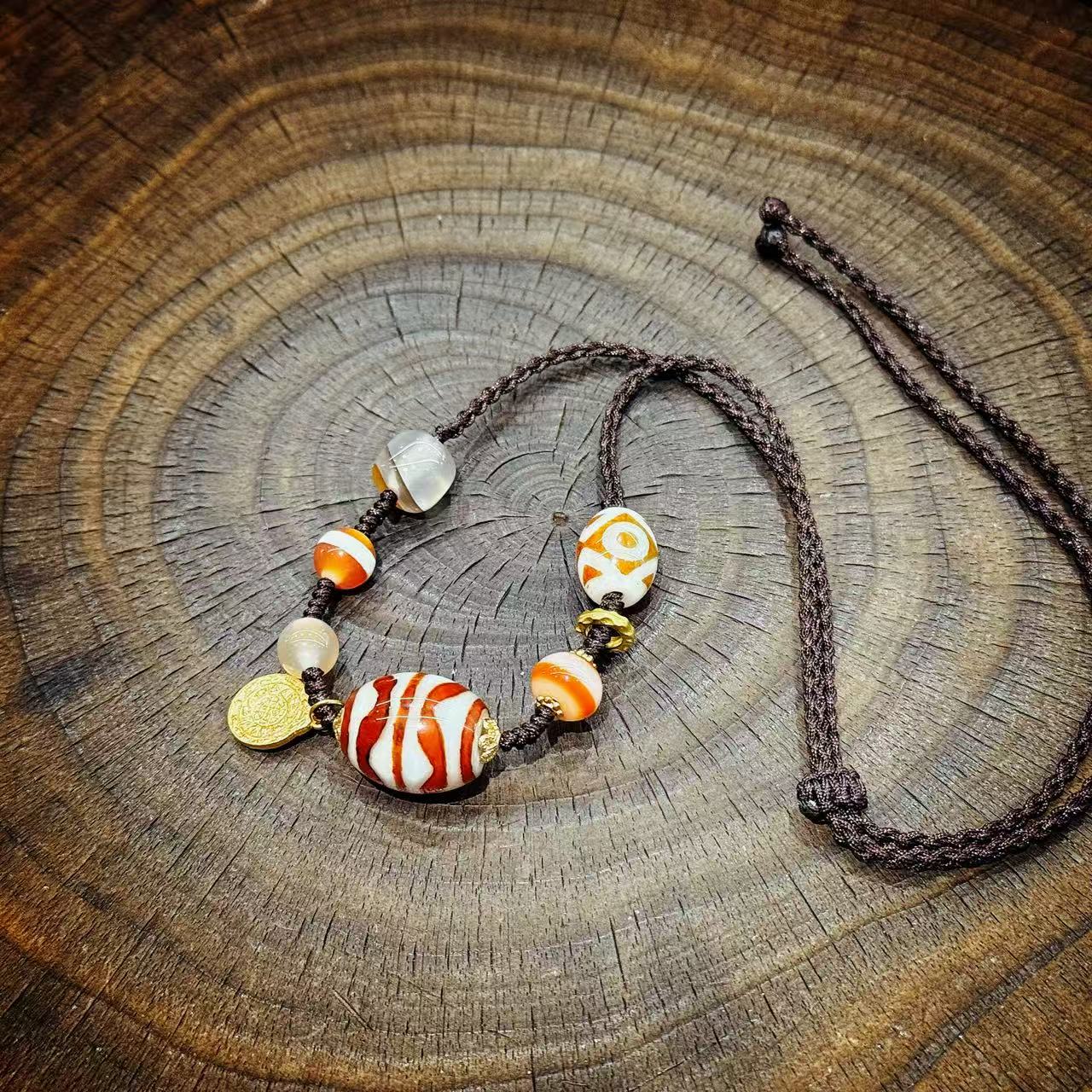 伽·元｜红肉一线双牙达洛锁骨链多样性发其一