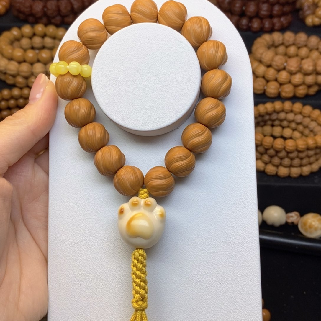 猴头核桃吊坠全品卷卷酥手持➕配饰