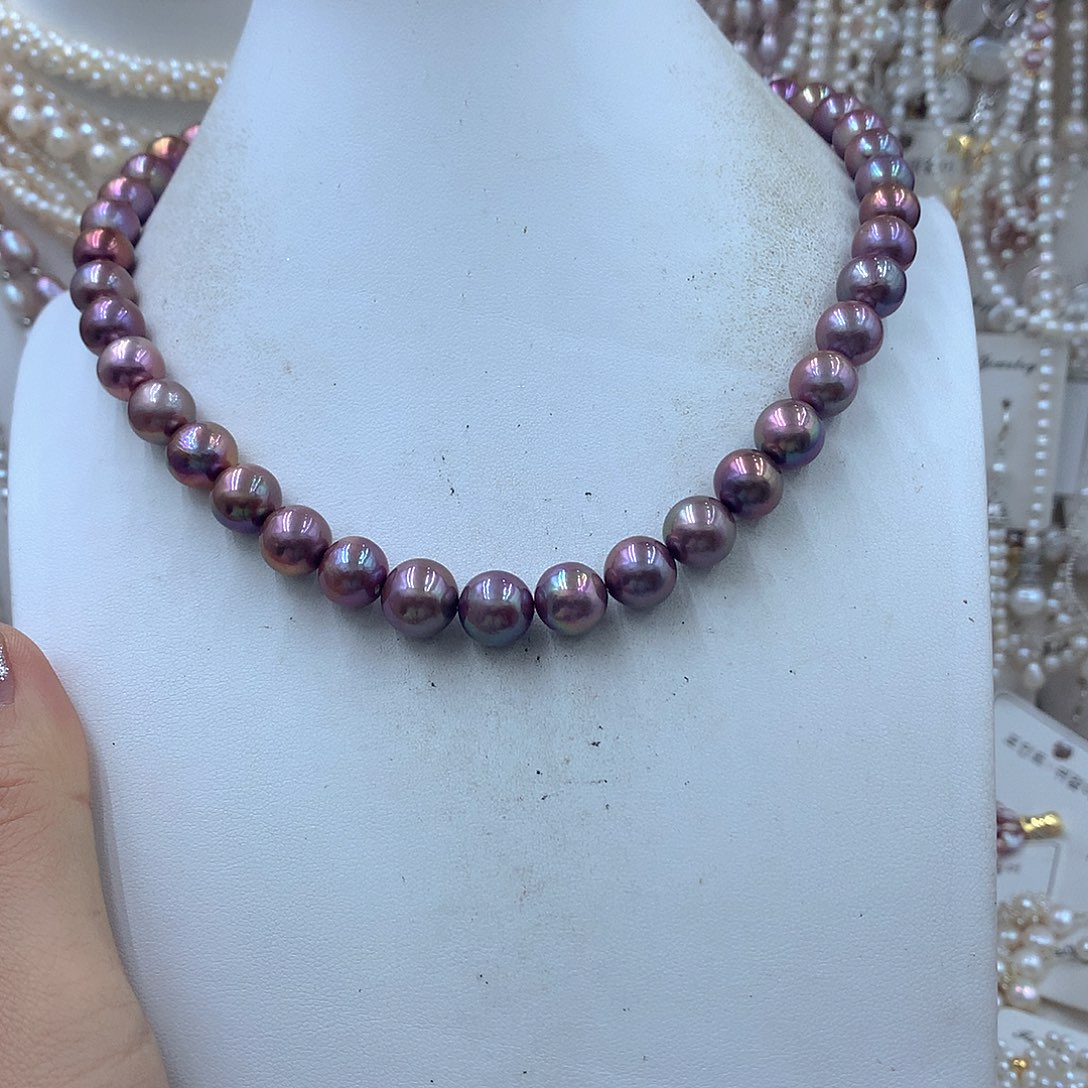 孟***佳银S925镶嵌淡水珍珠耳饰