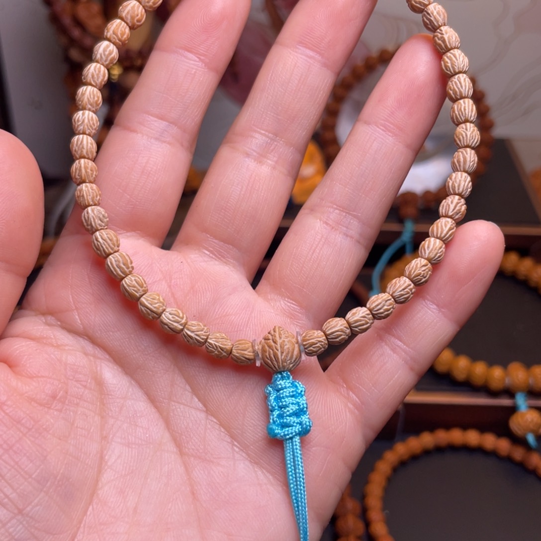 旭***桃核吊坠龙文桃核