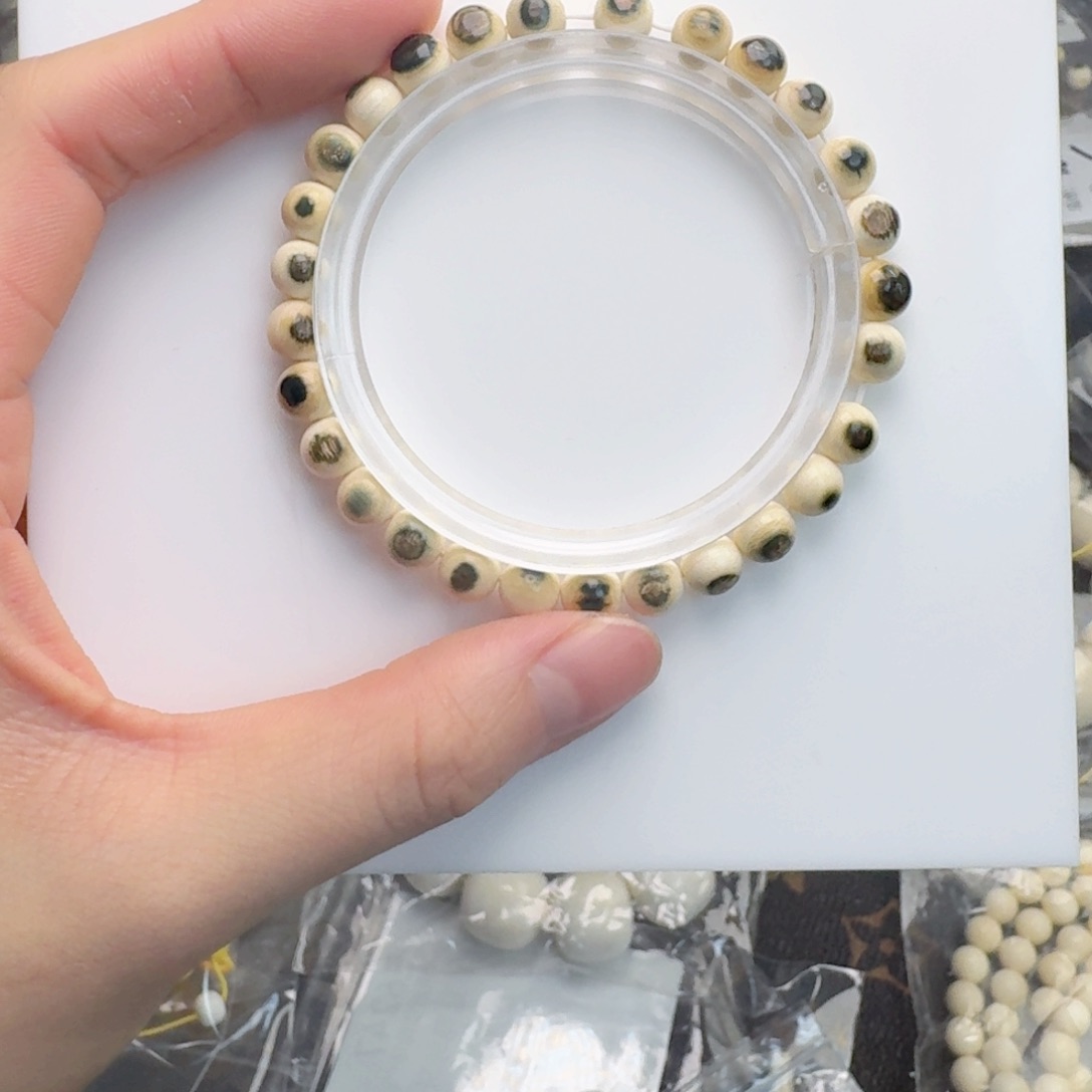 柏香籽/百香籽吊坠猛犸