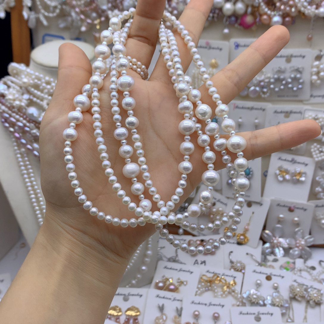 朵***儿合金淡水珍珠耳饰项链