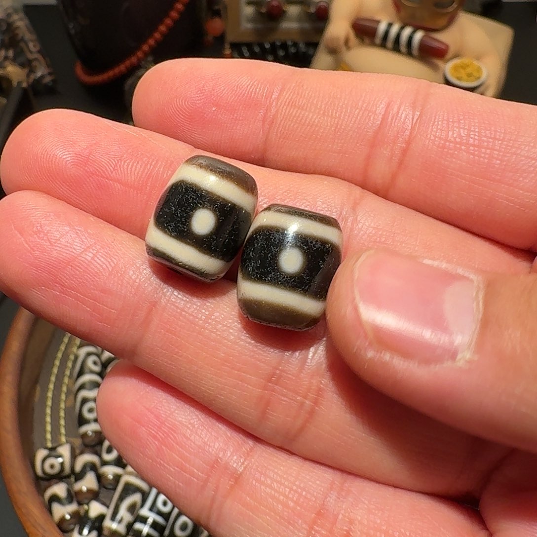 上肯超顶桶珠两眼