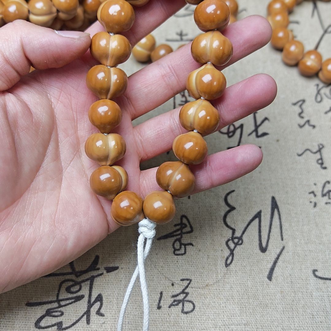 吊坠猴头核桃屁桃手串瑕款