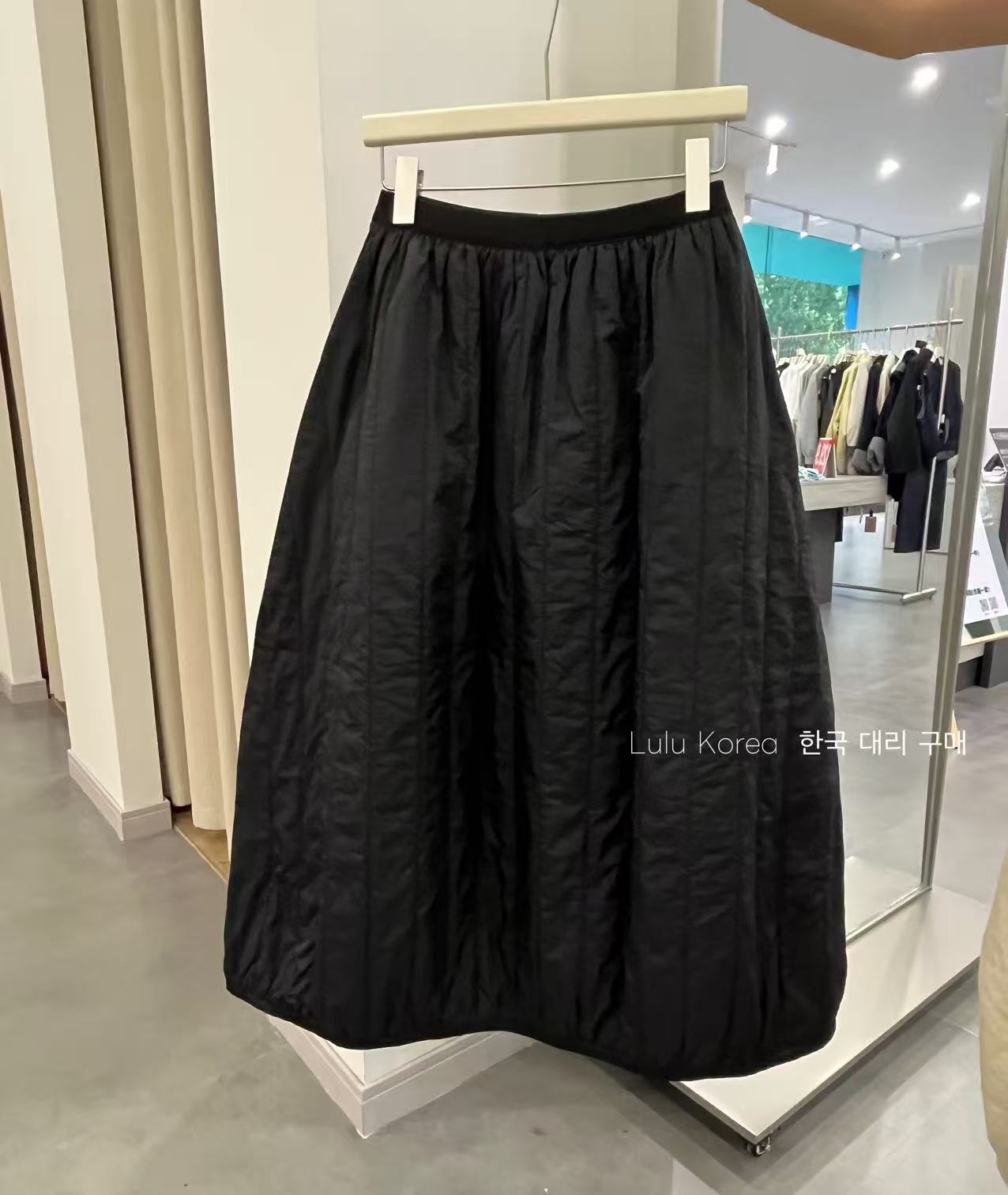 （花苞新宠）韩国代购！绗棉宽松大摆量全橡筋高腰花苞形半裙女C982