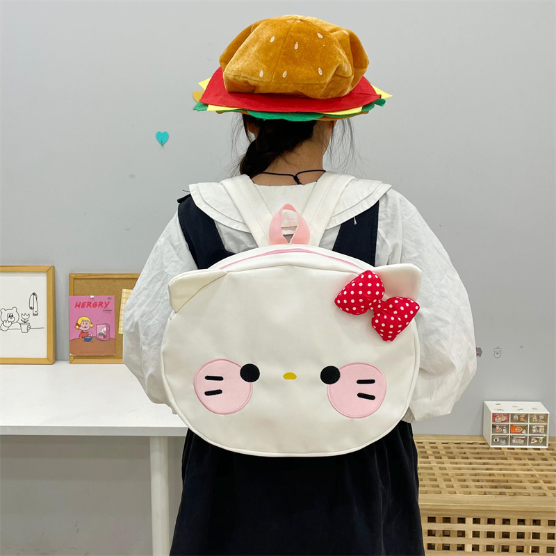 吉吉向上原创可爱日系百搭软妹布款大脸小猫双肩包大容量书包