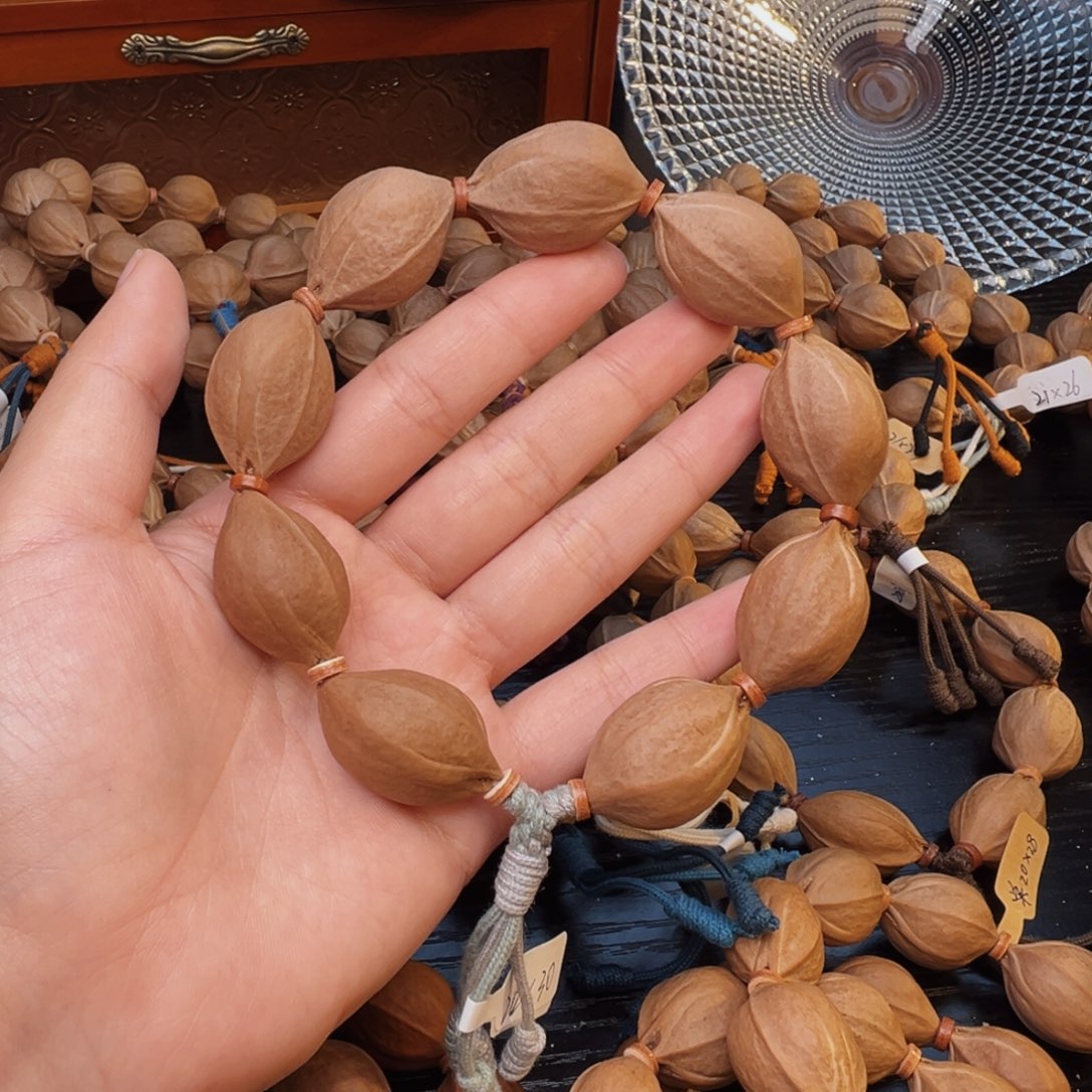 鹤***北吊坠橄榄核梅林铁核2030素串鲨鱼背