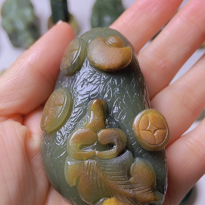 和田玉手把件未镶嵌