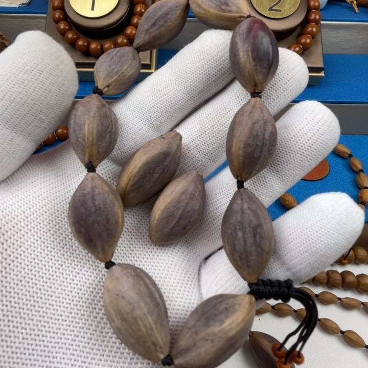 观***–手串橄榄核闪电购3