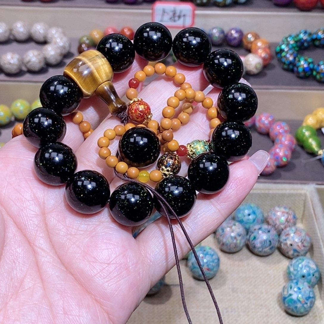 楚***清大漆珠1.5黑色满天星加橄榄核戒指