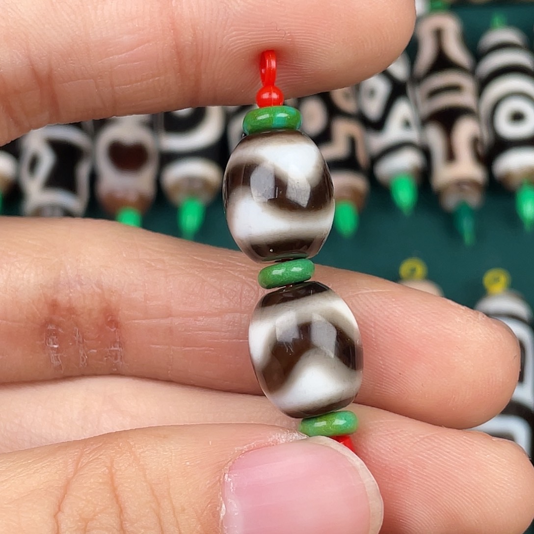 爱****玛瑙/玉髓裸珠虎牙