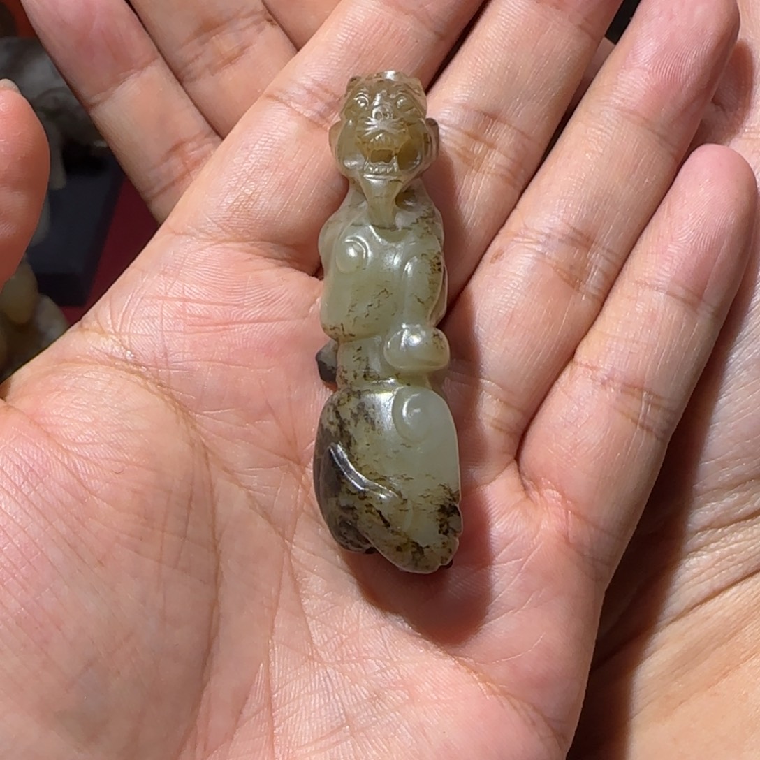 浪***_和田玉未镶嵌挂件