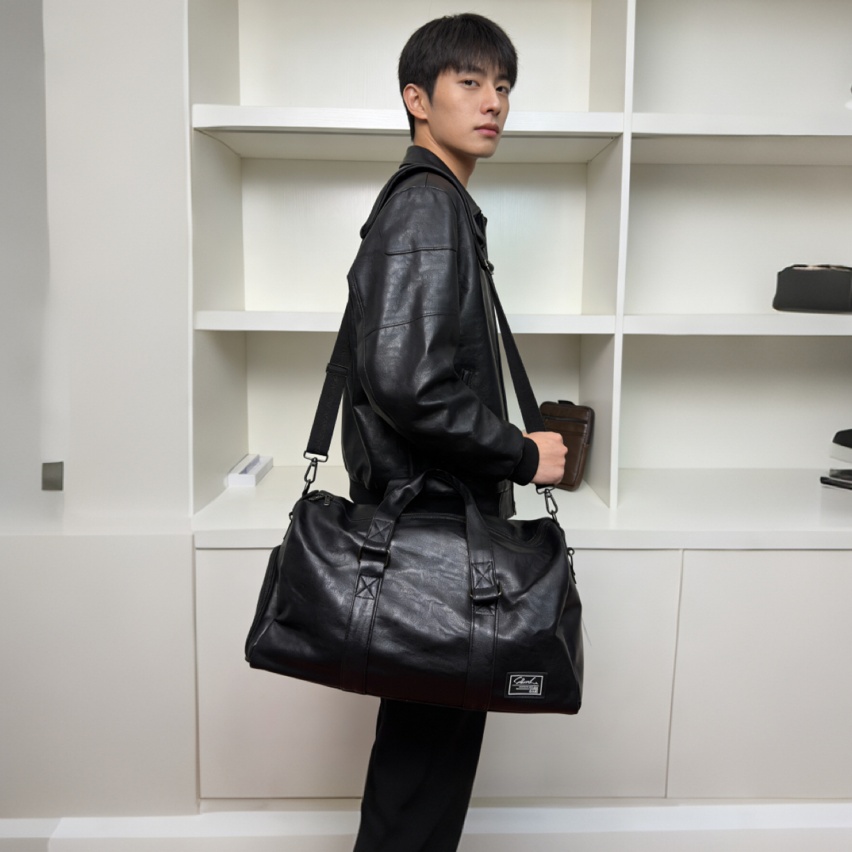 英皇撒驰法国英皇撒驰品牌头层牛皮旅行包