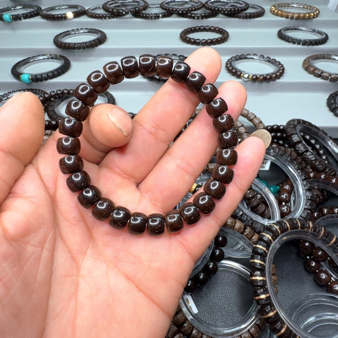 骑***行椰蒂吊坠印尼原生态精工椰蒂9x7直切